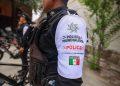 722306062_2226124164826830_8115072195363198101_n | Tu Colonia Nuevo León Police Officer in Tactical Gear with a White Shoulder Patch Reading 'policÍa Mundialista' and 'police' Alongside the Mexican Flag. | Tu Colonia Nuevo León